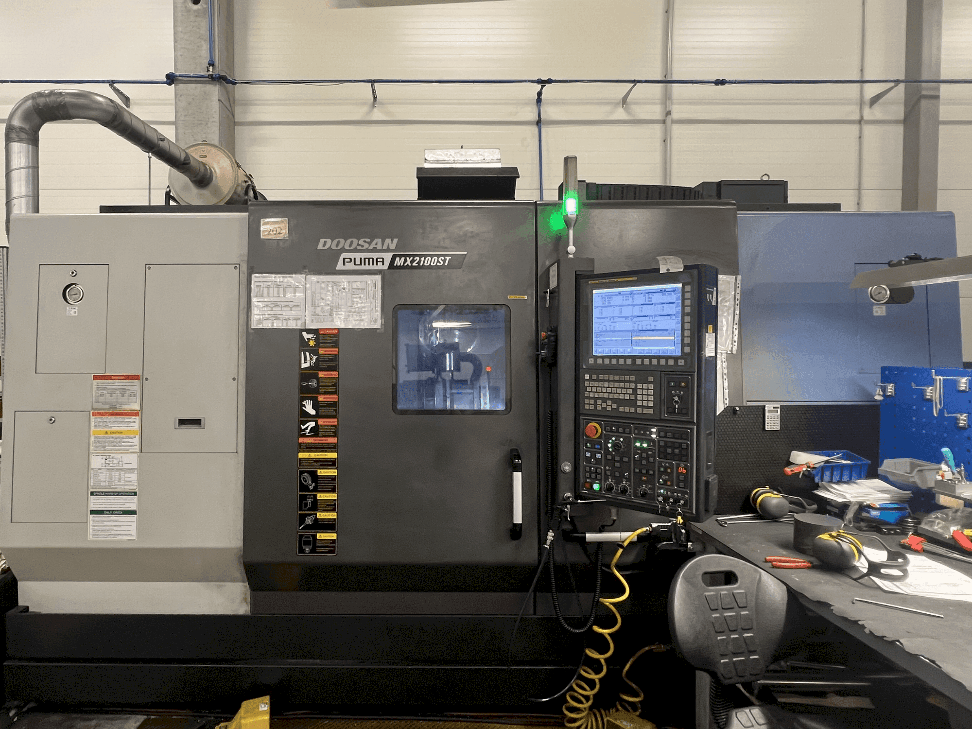 Front view of DOOSAN MX2100ST machine