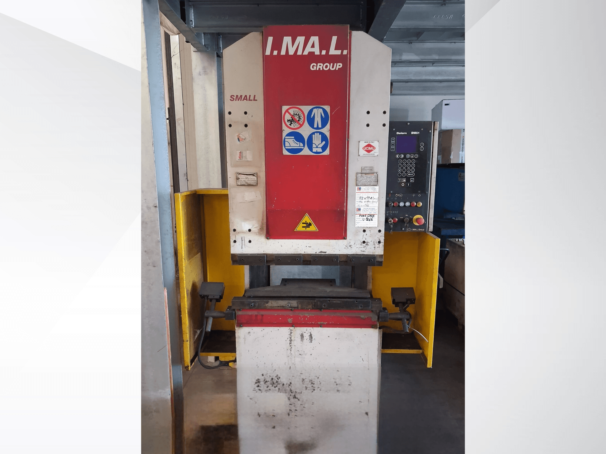Front view of IMAL SMALL 835/25 press brake with control panel, safety signs, and yellow protective guard.