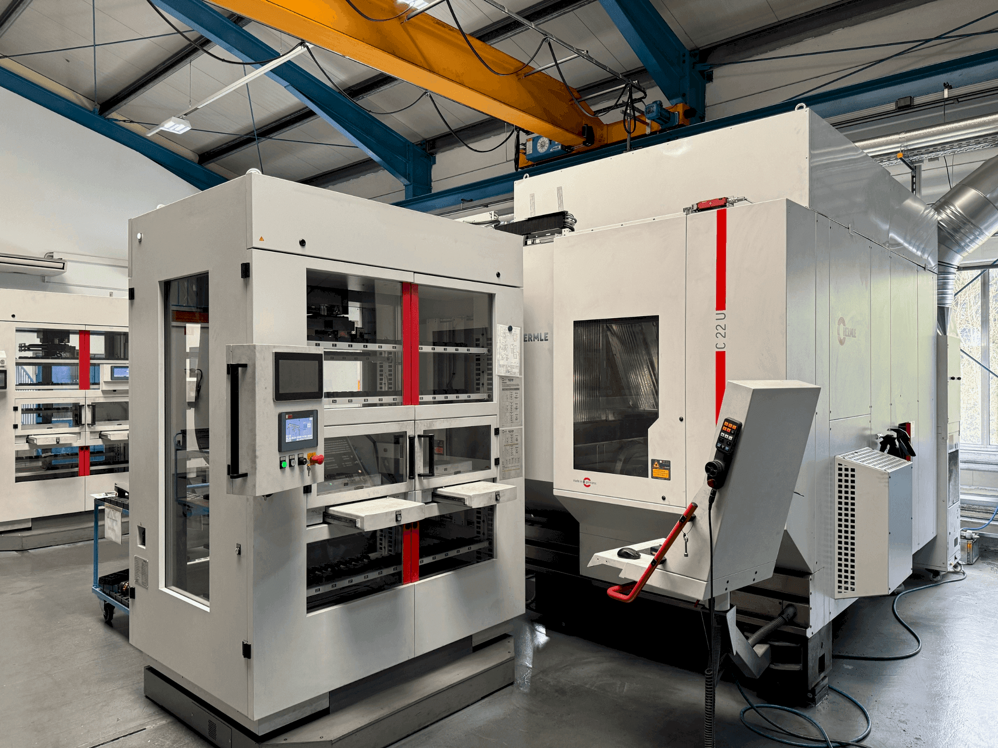 Front view of HERMLE C22 with handling system IH30 (2017) machine