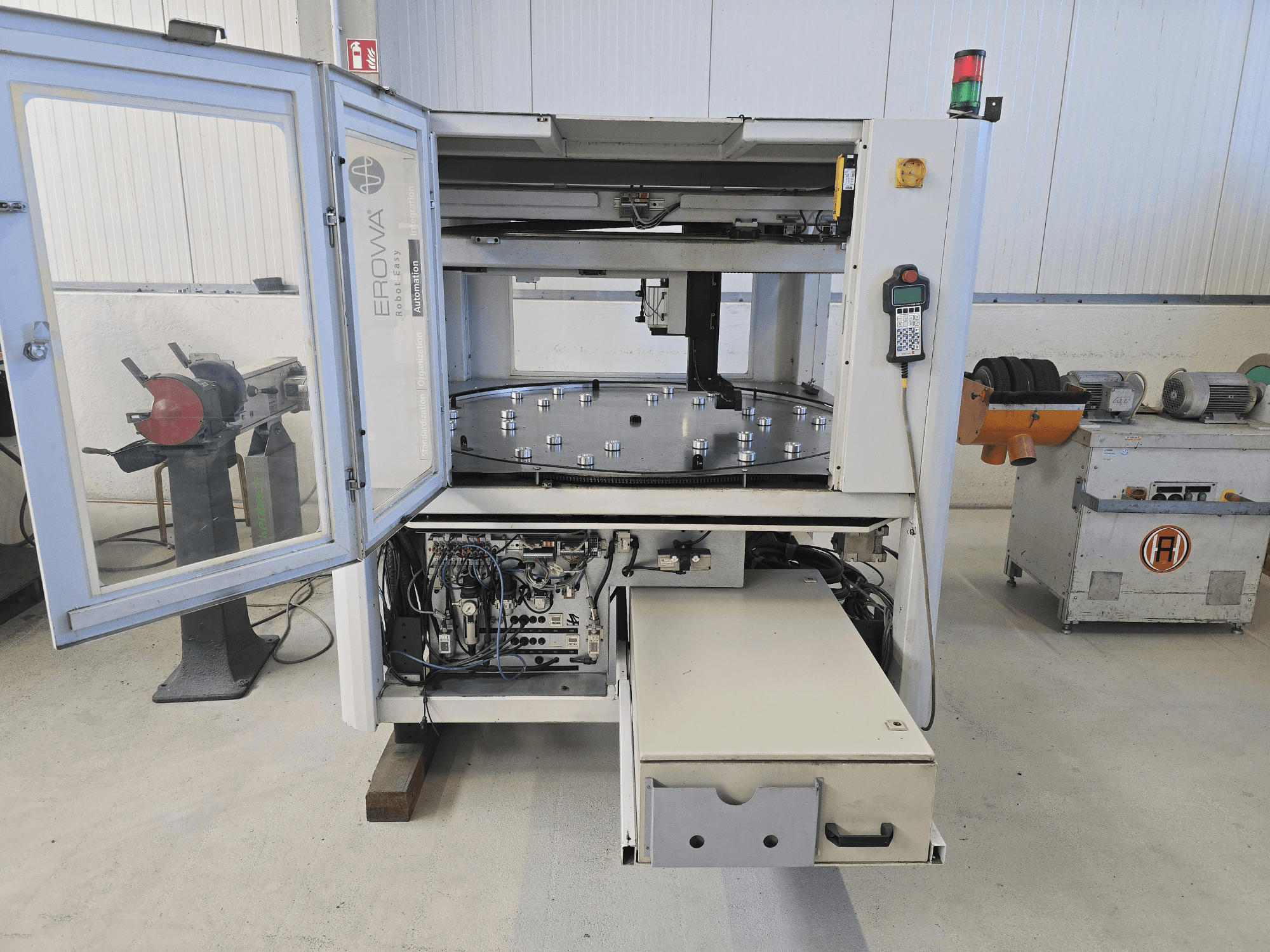 EROFA Robot Easy Automation automation system, front view with open door displaying internal components and controls.