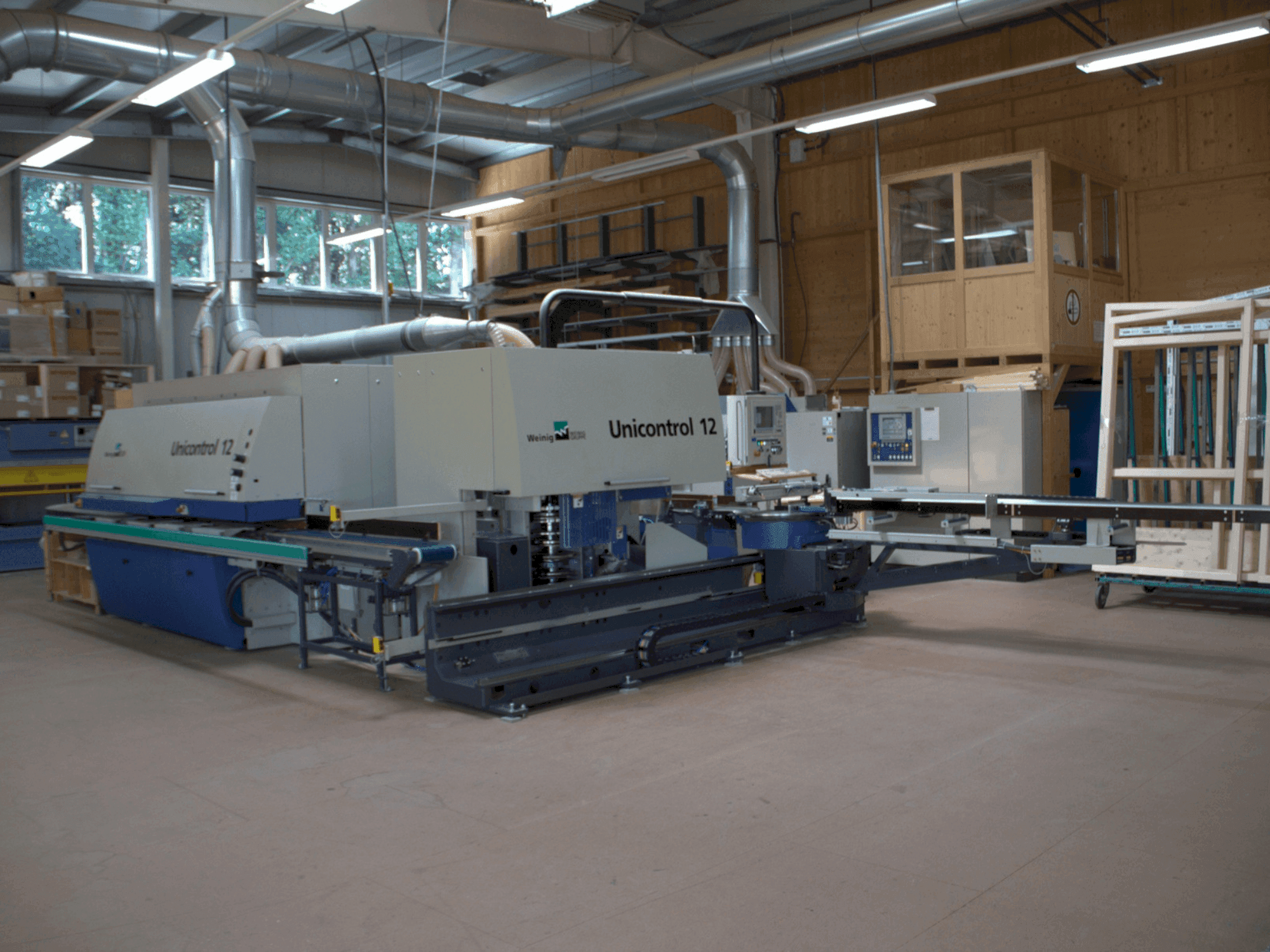 Front view of WEINIG / DIMTER UNICONTROL 12 machine