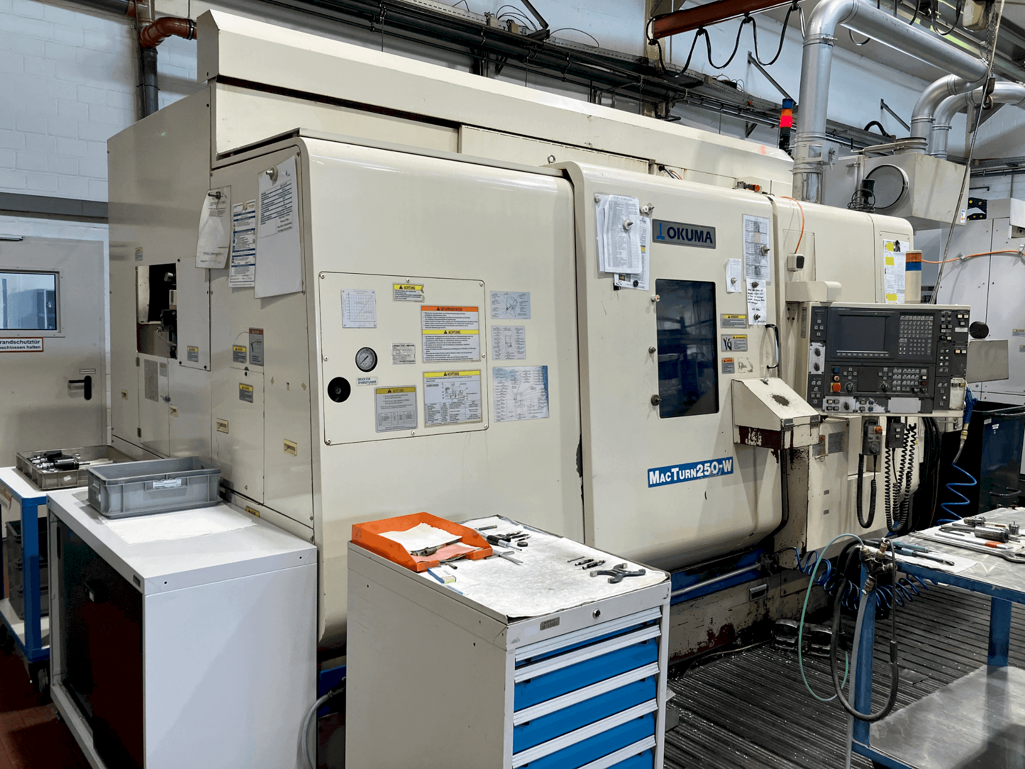 Front view of Okuma MacTurn 250-W machine