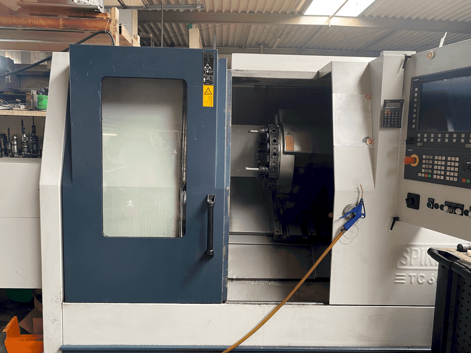 Front view of SPINNER TC 600-65MC machine